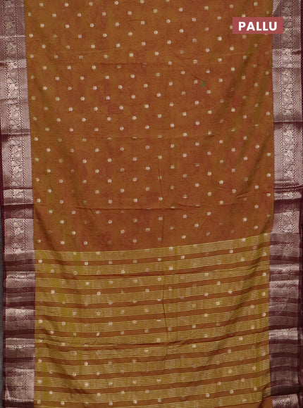 Semi raw silk saree dark mustard and maroon with allover kalamkari prints & 1000 zari buttas and zari woven border