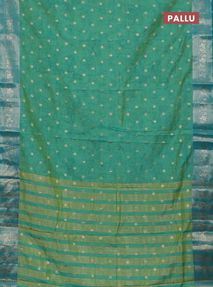 Semi raw silk saree teal shade and cs blue with allover kalamkari prints & 1000 zari buttas and zari woven border