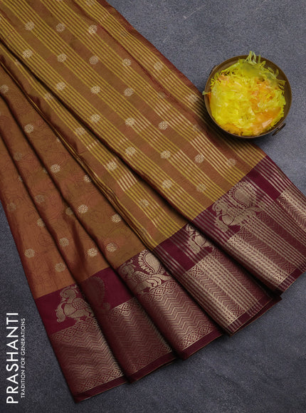 Semi raw silk saree dark mustard and deep maroon with allover kalamkari prints & 1000 zari buttas and zari woven border