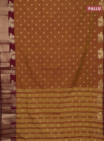 Semi raw silk saree dark mustard and deep maroon with allover kalamkari prints & 1000 zari buttas and zari woven border