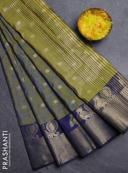 Semi raw silk saree sap green and navy blue with allover kalamkari prints & 1000 zari buttas and zari woven border