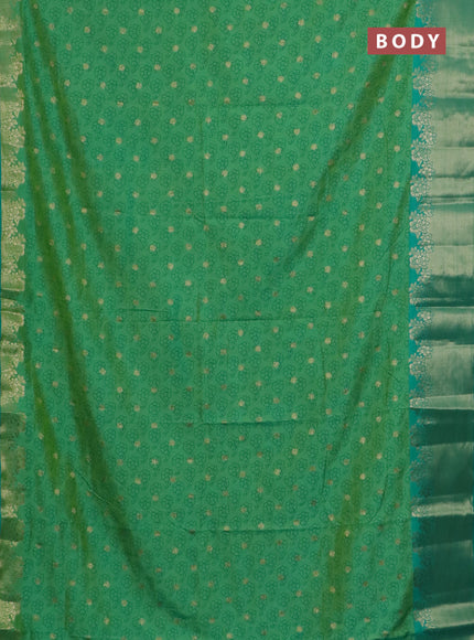 Semi raw silk saree teal green with floral prints & 1000 buttas and zari woven border