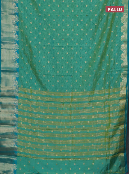 Semi raw silk saree teal green and blue with floral prints & 1000 buttas and zari woven border