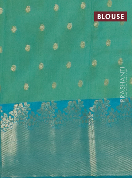 Semi raw silk saree teal green and blue with floral prints & 1000 buttas and zari woven border