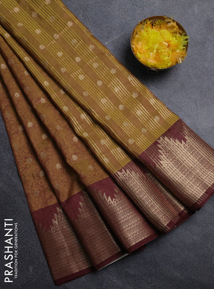 Semi raw silk saree mehendi green and brown with allover kalamkari prints & 1000 zari buttas and temple design zari woven border