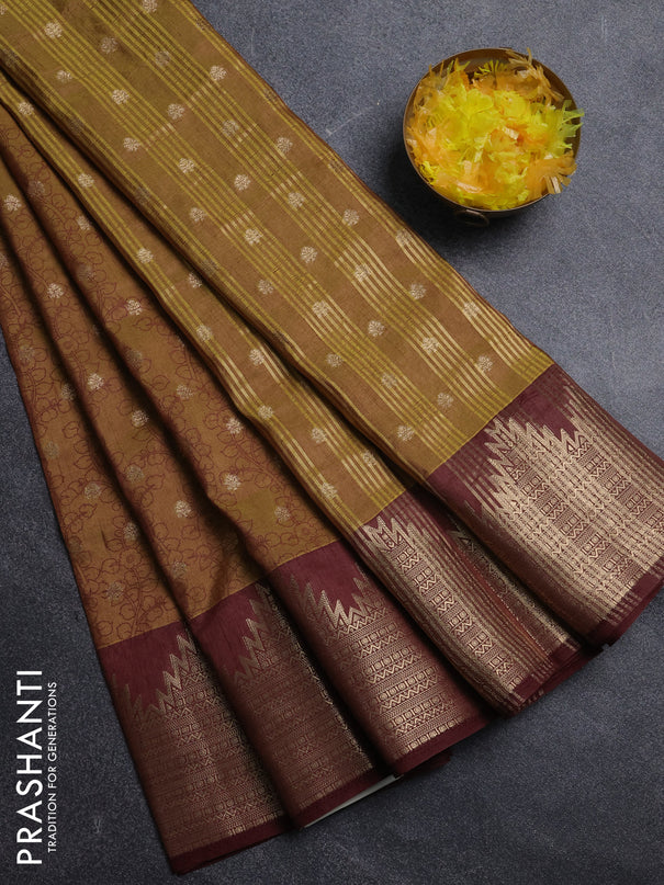 Semi raw silk saree mehendi green and brown with allover kalamkari prints & 1000 zari buttas and temple design zari woven border