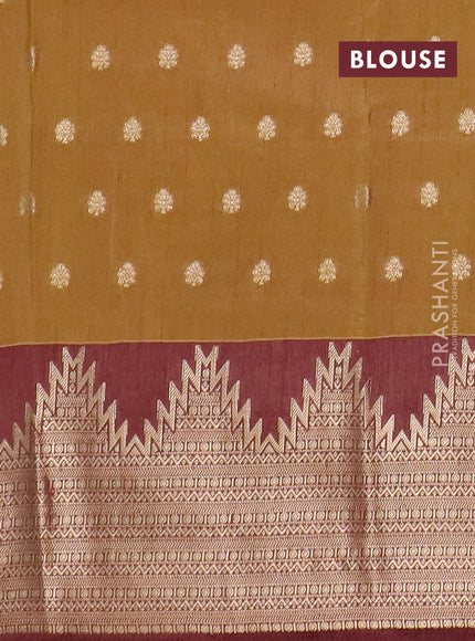 Semi raw silk saree mehendi green and brown with allover kalamkari prints & 1000 zari buttas and temple design zari woven border