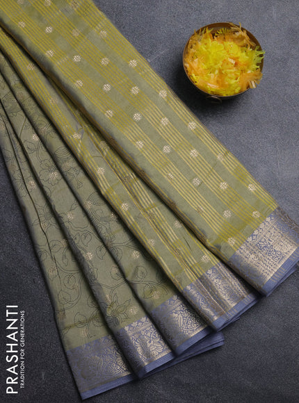 Semi raw silk saree elaichi green and grey with allover kalamkari prints & 1000 zari buttas and temple design zari woven border