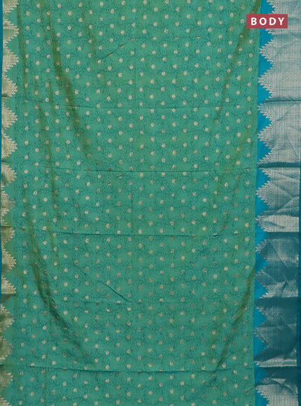 Semi raw silk saree dual shade of teal bluish green and teal green with allover kalamkari prints & 1000 zari buttas and temple design zari woven border