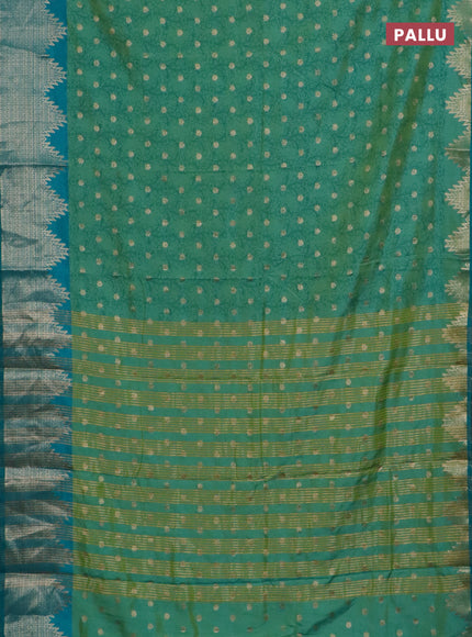 Semi raw silk saree dual shade of teal bluish green and teal green with allover kalamkari prints & 1000 zari buttas and temple design zari woven border