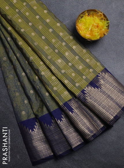 Semi raw silk saree mehendi green and navy blue with allover kalamkari prints & 1000 zari buttas and temple design zari woven border