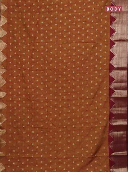 Semi raw silk saree dark mustard and deep maroon with allover kalamkari prints & 1000 zari buttas and temple design zari woven border