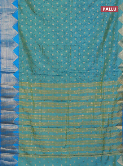Semi raw silk saree dual shade of teal blue and cs blue with allover kalamkari prints & 1000 zari buttas and temple design zari woven border