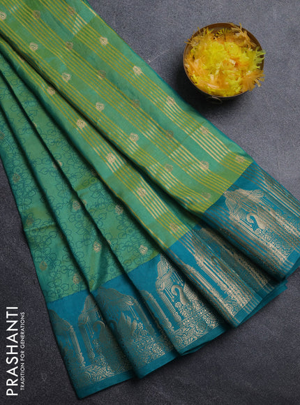 Semi raw silk saree dual shade of teal bluish green and teal green with allover kalamkari prints & 1000 zari buttas and zari woven butta border