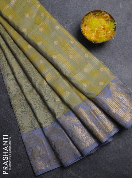 Semi raw silk saree elaichi green and grey with allover kalamkari prints & 1000 zari buttas and zari woven butta border