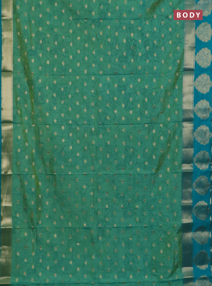 Semi raw silk saree dual shade of teal bluish green and teal green with allover kalamkari prints & 1000 zari buttas and zari woven butta border