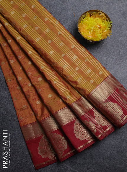 Semi raw silk saree dual shade of dark mustard and maroon with allover kalamkari prints & 1000 zari buttas and zari woven butta border