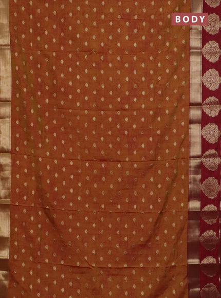 Semi raw silk saree dual shade of dark mustard and maroon with allover kalamkari prints & 1000 zari buttas and zari woven butta border