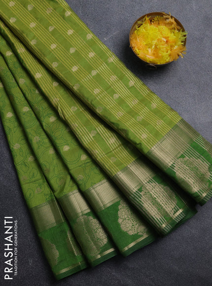 Semi raw silk saree light green and green with allover kalamkari prints & 1000 zari buttas and zari woven butta border