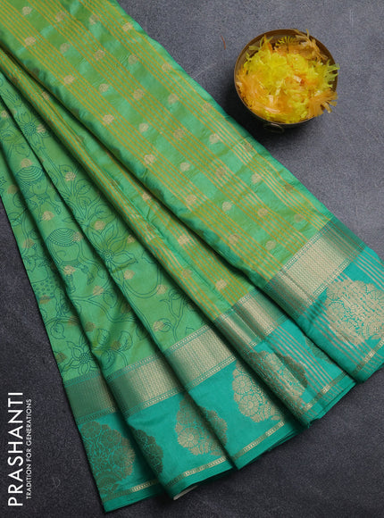 Semi raw silk saree dual shade of teal green and teal green with allover kalamkari prints & 1000 zari buttas and zari woven butta border