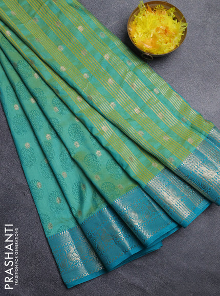 Semi raw silk saree dual shade of teal blue and teal blue with allover floral butta prints & 1000 zari buttas and zari woven border