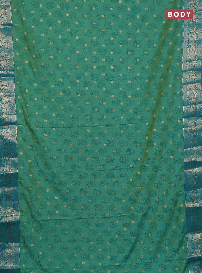 Semi raw silk saree dual shade of teal blue and teal blue with allover floral butta prints & 1000 zari buttas and zari woven border