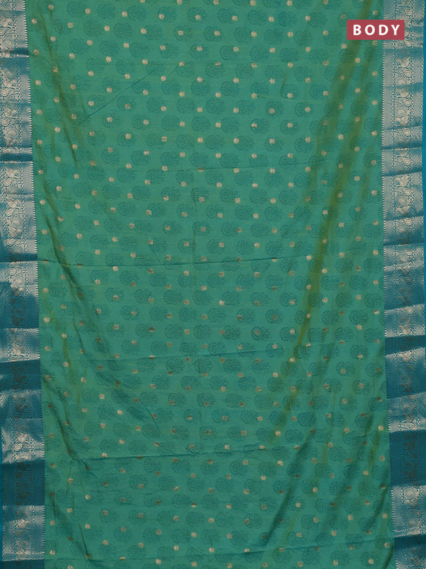 Semi raw silk saree dual shade of teal blue and teal blue with allover floral butta prints & 1000 zari buttas and zari woven border