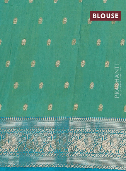 Semi raw silk saree dual shade of teal blue and teal blue with allover floral butta prints & 1000 zari buttas and zari woven border