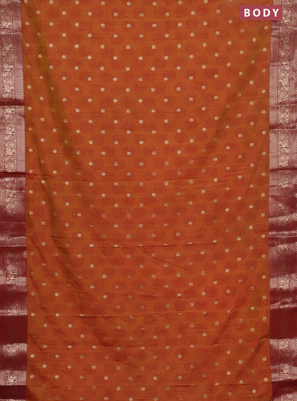 Semi raw silk saree dual shade of dark mustard and maroon with allover floral butta prints & 1000 zari buttas and zari woven border
