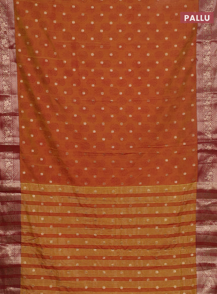 Semi raw silk saree dual shade of dark mustard and maroon with allover floral butta prints & 1000 zari buttas and zari woven border