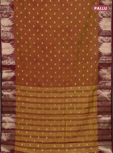 Semi raw silk saree dual shade of dark mustard green and wine shade with allover kalamkari prints & 1000 zari buttas and zari woven border