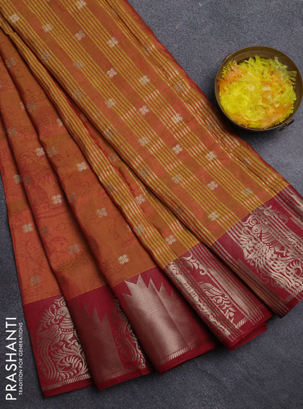 Semi raw silk saree dual shade of dark mustard and maroon with allover kalamkari prints & 1000 zari buttas and zari woven border