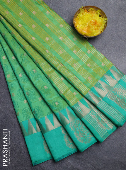Semi raw silk saree dual shade of light green and teal green with allover floral butta prints & 1000 zari buttas and temple design zari woven butta border