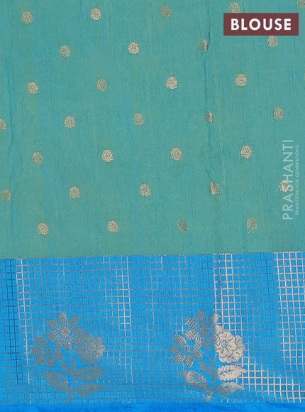 Semi raw silk saree teal shade and cs blue with allover prints & 1000 buttas and zari checked butta border
