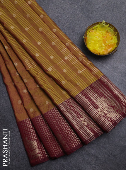Semi raw silk saree dark mustard and maroon with allover prints & 1000 buttas and zari checked butta border