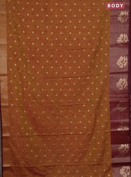 Semi raw silk saree dark mustard and maroon with allover prints & 1000 buttas and zari checked butta border