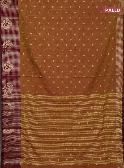 Semi raw silk saree dark mustard and maroon with allover prints & 1000 buttas and zari checked butta border