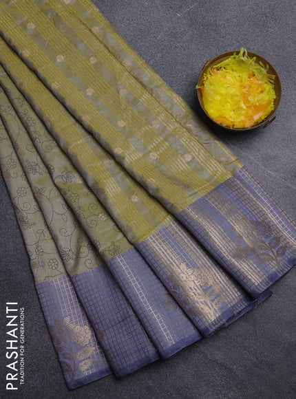 Semi raw silk saree elaichi green and bluish grey with allover prints & 1000 buttas and zari checked butta border