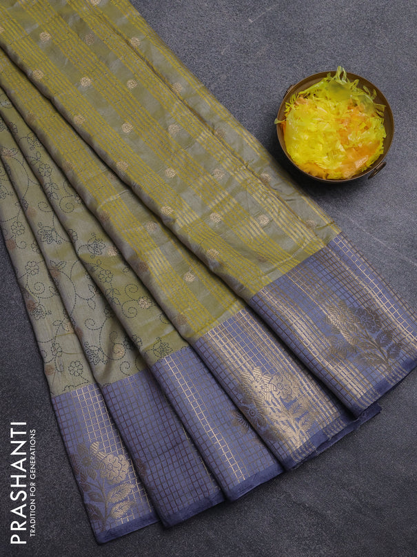 Semi raw silk saree elaichi green and bluish grey with allover prints & 1000 buttas and zari checked butta border