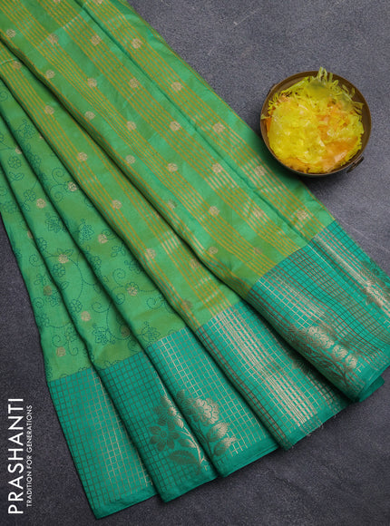 Semi raw silk saree light green and teal green with allover prints & 1000 buttas and zari checked butta border