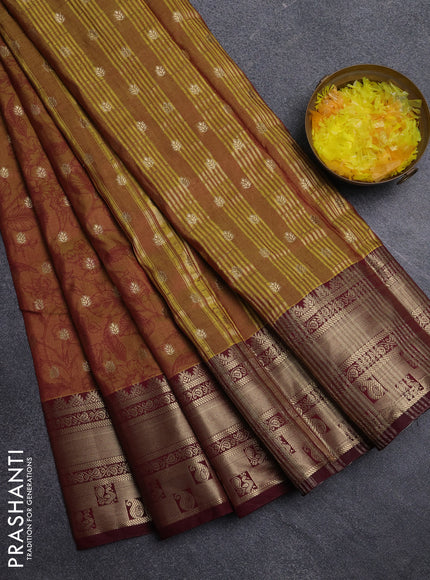 Semi raw silk saree dual shade of dark mustard green and wine shade with allover kalamkari prints & 1000 buttas and zari woven border