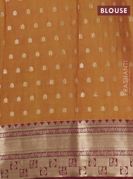 Semi raw silk saree dual shade of dark mustard green and wine shade with allover kalamkari prints & 1000 buttas and zari woven border