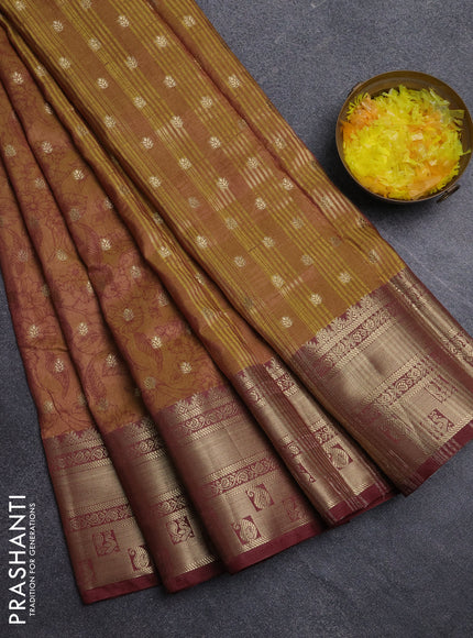Semi raw silk saree dark mustard and brown shade with allover kalamkari prints & 1000 buttas and zari woven border