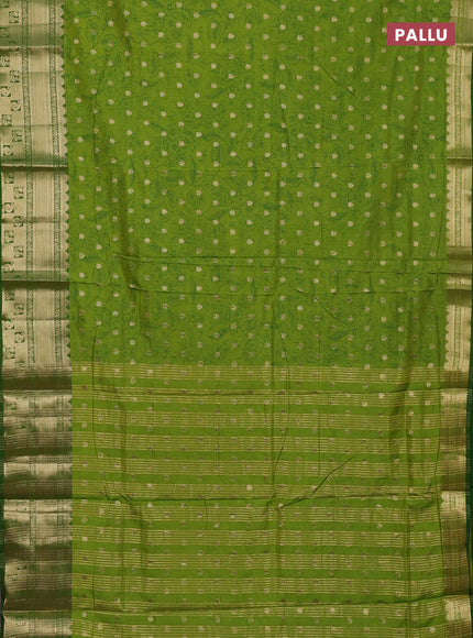 Semi raw silk saree light green and green with allover kalamkari prints & 1000 buttas and zari woven border
