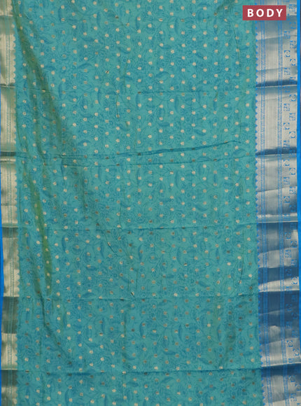 Semi raw silk saree dual shade of teal blue and cs blue with allover kalamkari prints & 1000 buttas and zari woven border