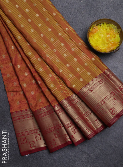 Semi raw silk saree dual shade of dark mustard and maroon with allover kalamkari prints & 1000 buttas and zari woven border
