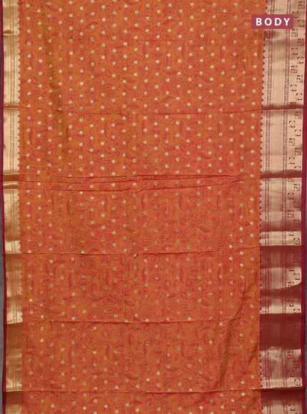 Semi raw silk saree dual shade of dark mustard and maroon with allover kalamkari prints & 1000 buttas and zari woven border