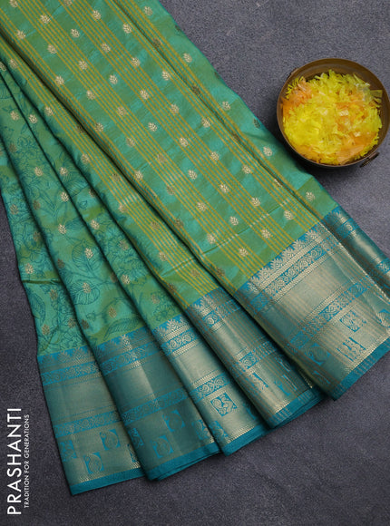 Semi raw silk saree dual shade of teal bluish green and teal green with allover kalamkari prints & 1000 buttas and zari woven border