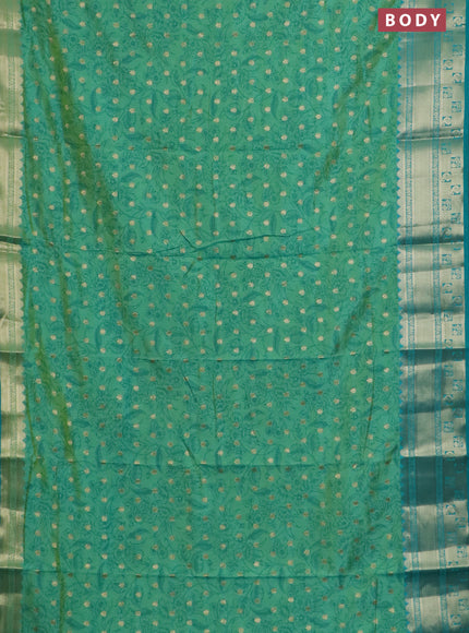 Semi raw silk saree dual shade of teal bluish green and teal green with allover kalamkari prints & 1000 buttas and zari woven border