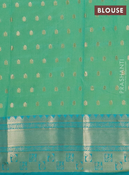 Semi raw silk saree dual shade of teal bluish green and teal green with allover kalamkari prints & 1000 buttas and zari woven border